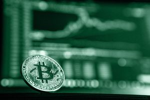 Immagine del bitcoin che simboleggia il caso dell'italiano rapito e torturato a New York.